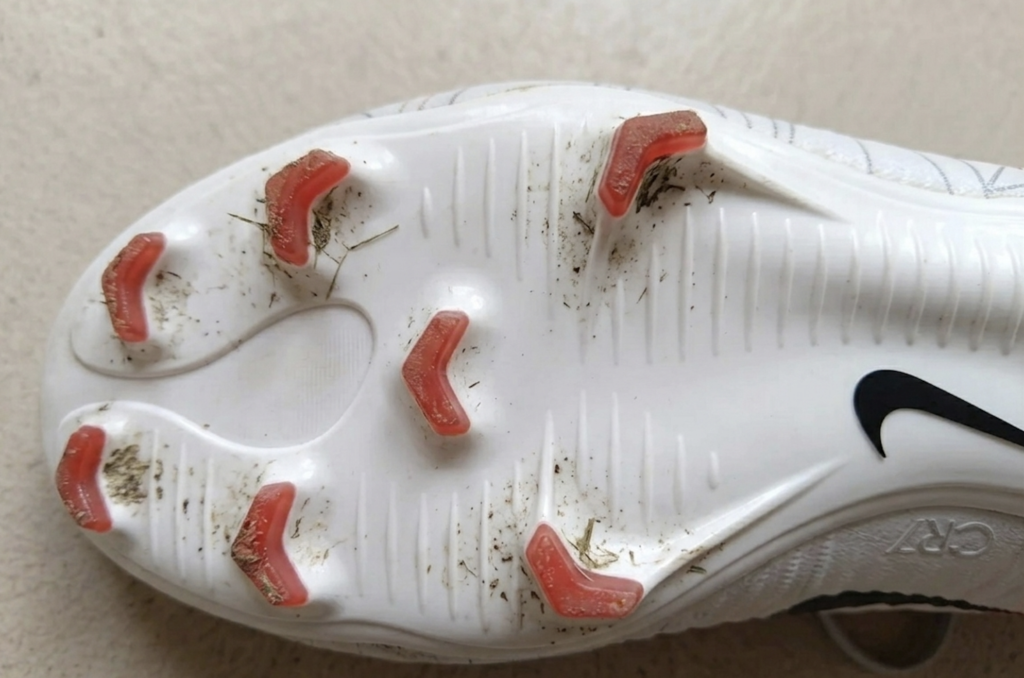Worn Nike Mercurial firm ground sole after nine years of use
